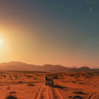 A pickup on a desert road